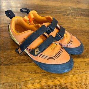 Bright orange women’s climbing shoes